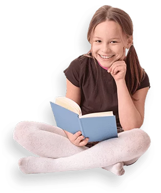 girl  sitting cross legged holding a book